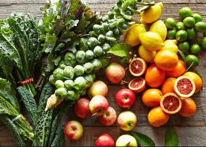 a group of fruits and vegetables on a wood surface Healthy Weight Loss Diets Selly Oak